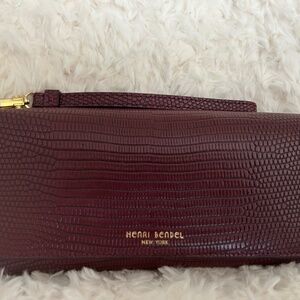 Henri Bendel Uptown Tri Fold leather wallet /wristlet clutch - burgundy